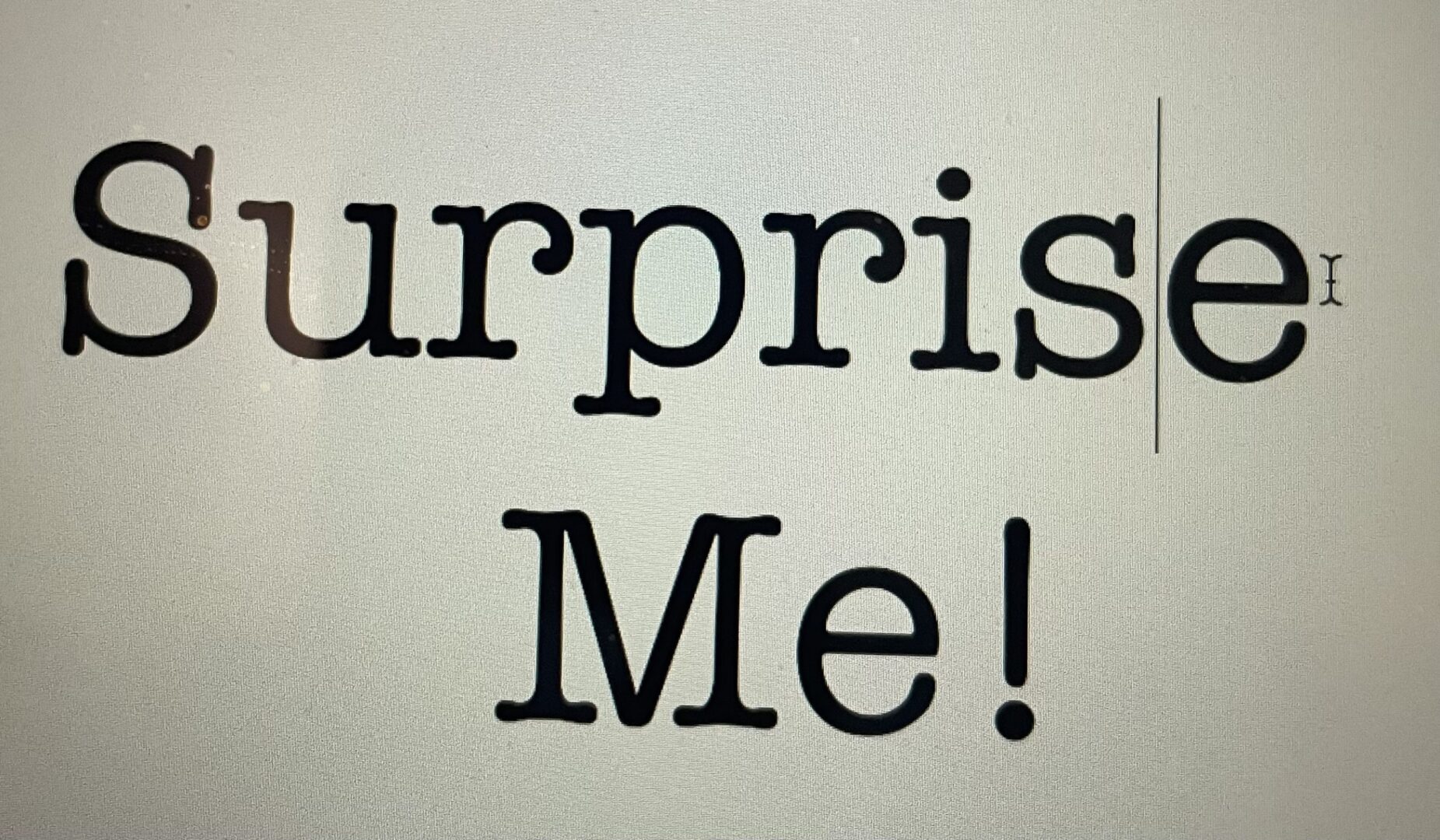 The words “Surprise Me!”